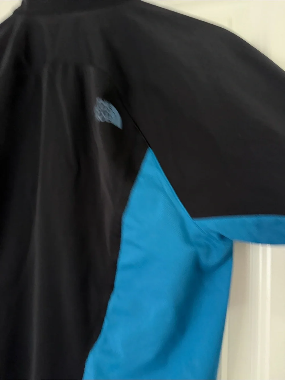 The North Face Black Jacket with Blue Trim